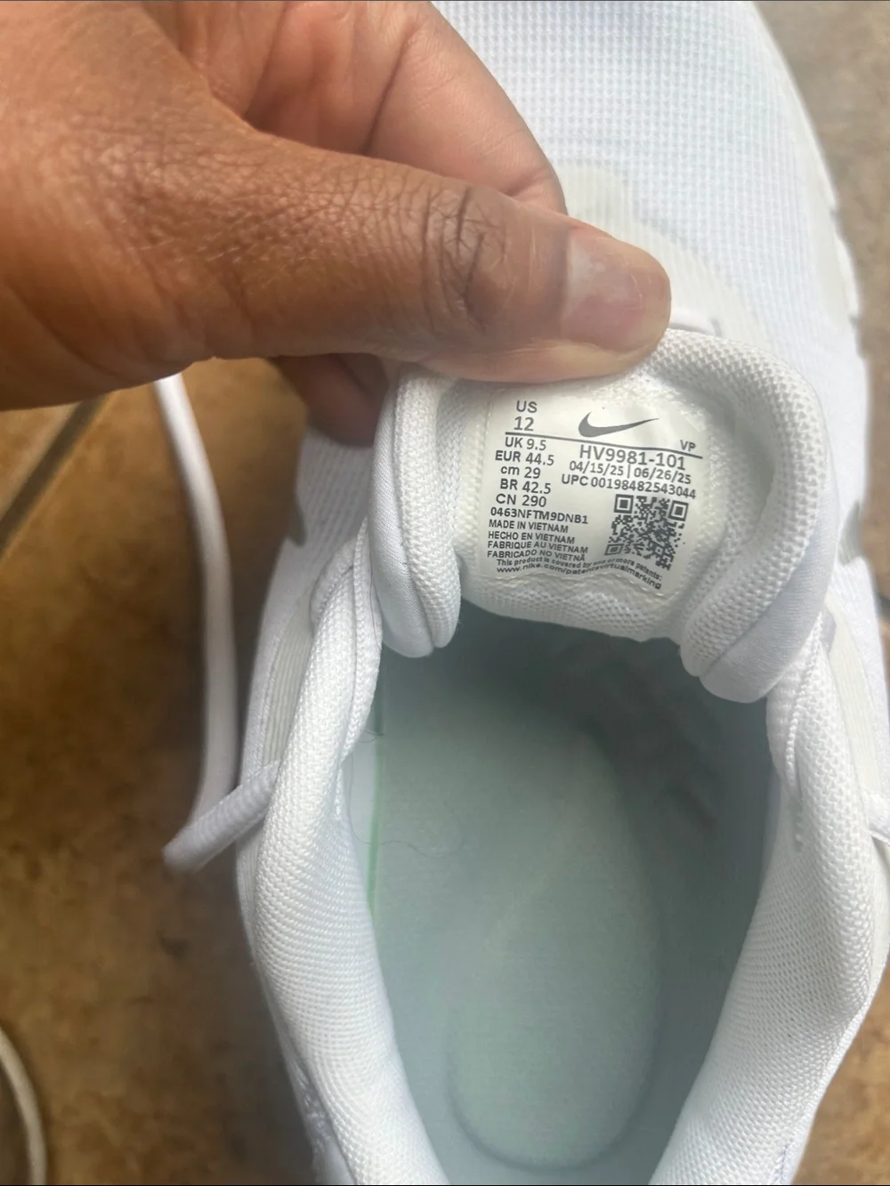 Nike Women’s White Mesh Sneakers with Silver Swoosh